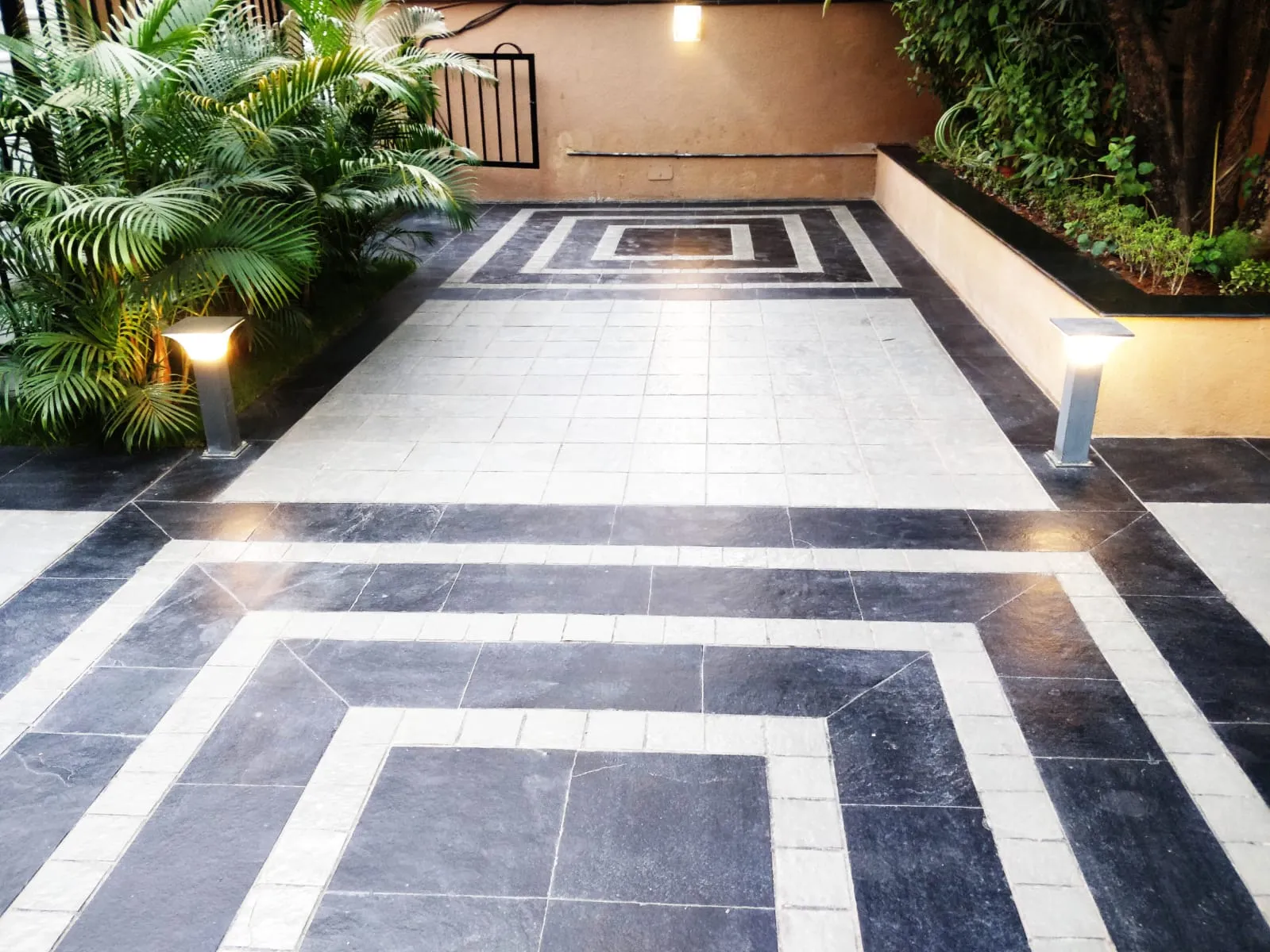 Basalt stepping-stone path through dense planting