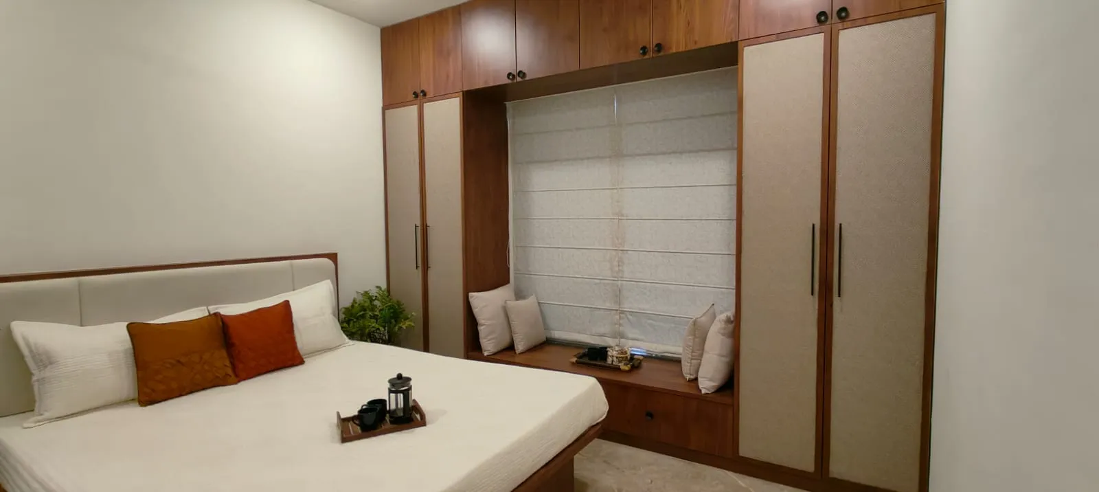 Renovated kitchen with Athangudi tile splashback and accessible storage