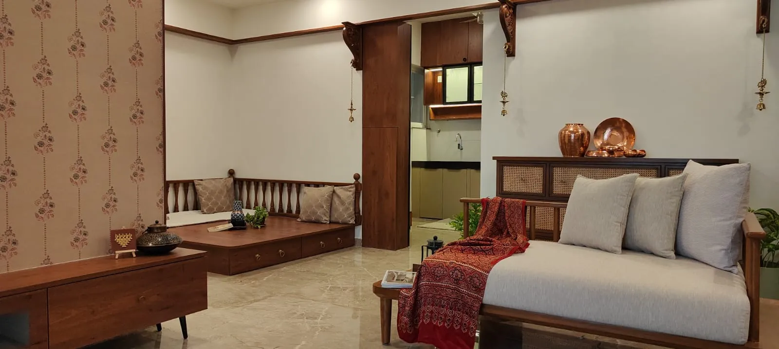 Living room with restored teak furniture, new lighting and original artwork